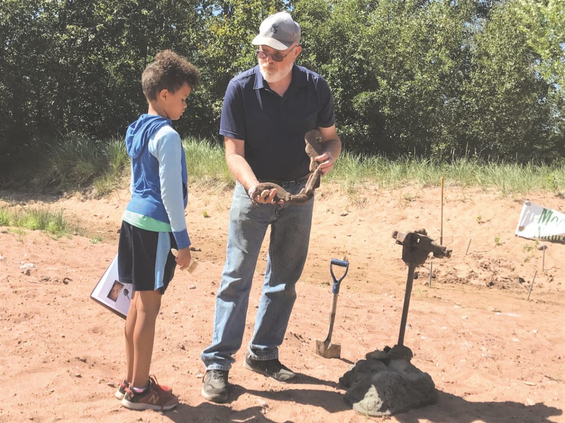 Doing a DinoDig Youngsters learn about paleontology News, Sports